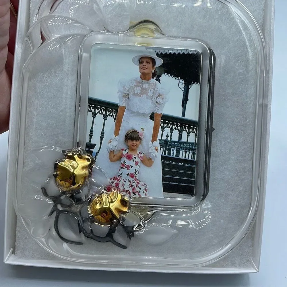 Fifth Avenue Crystal picture frame. Picture size 2.5” x 3.5”